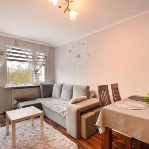Apartament 4-osobowy z balkonem z 2 pomieszczeniami sypialnianymi