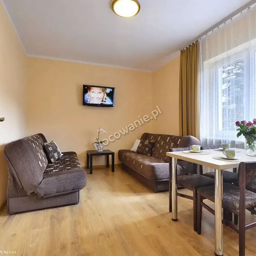 Apartament cu grădină cu chicinetă proprie cu 2 camere pentru 4 pers.
