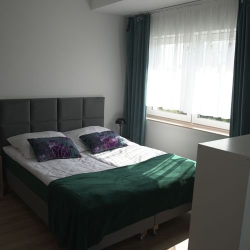 Apartament 4-osobowy na parterze z widokiem na jezioro z 1 pomieszczeniem sypialnianym