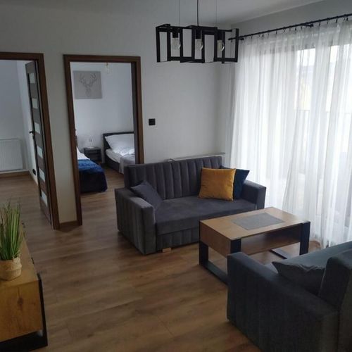 Apartament 6-osobowy z balkonem z aneksem kuchennym z 3 pomieszczeniami sypialnianymi