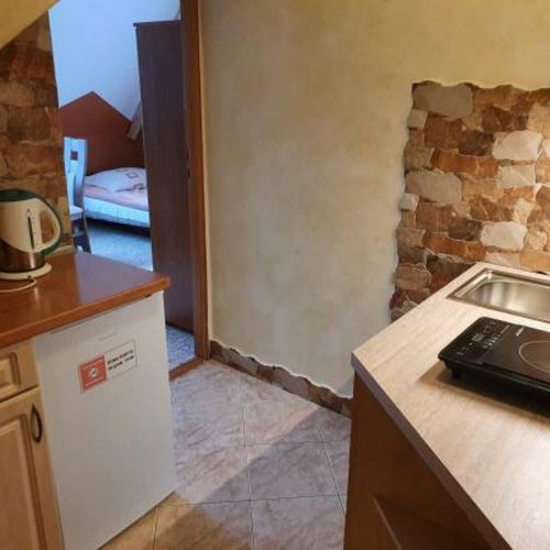 Pokój 4-osobowy z balkonem z aneksem kuchennym