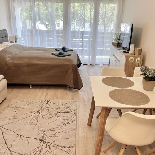 Apartament 4-osobowy na parterze z tarasem z 1 pomieszczeniem sypialnianym