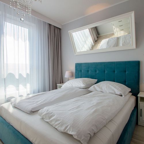 Apartament 4-osobowy z 2 pomieszczeniami sypialnianymi