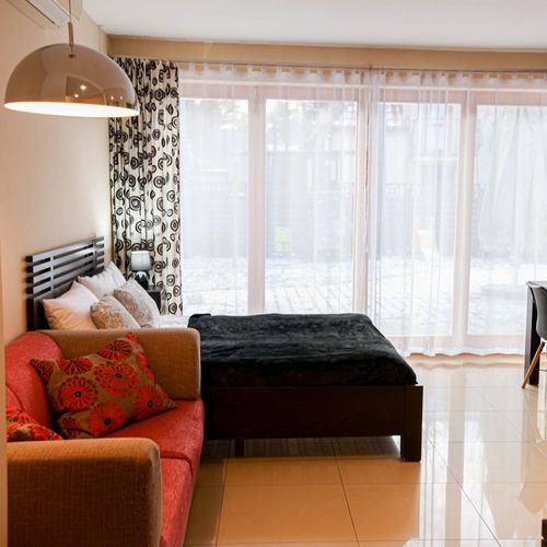 Apartament 4-osobowy z tarasem z aneksem kuchennym z 1 pomieszczeniem sypialnianym