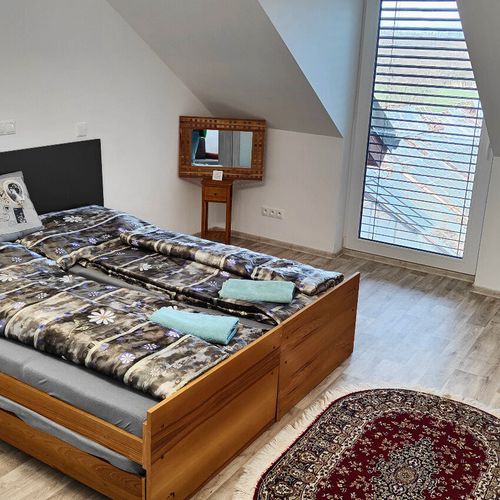 Apartament 4-osobowy z prysznicem z aneksem kuchennym z 2 pomieszczeniami sypialnianymi (możliwa dostawka)