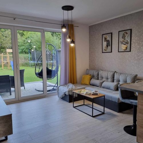 Apartament 4-osobowy parterowy Komfort (możliwa dostawka)