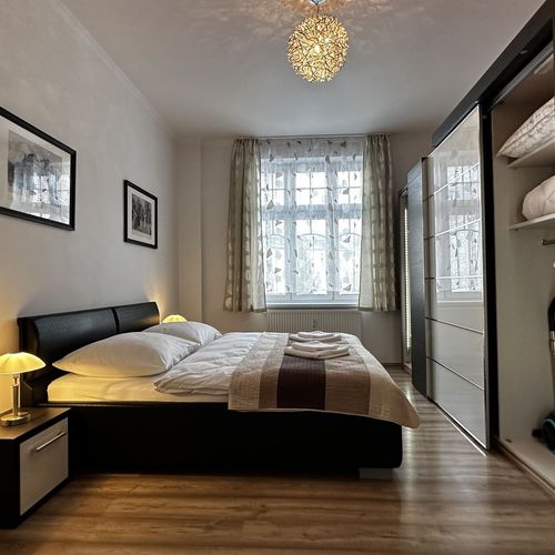 Komfort Apartman s balkónem s manželskou postelí s 1 ložnicí (s možností přistýlky)