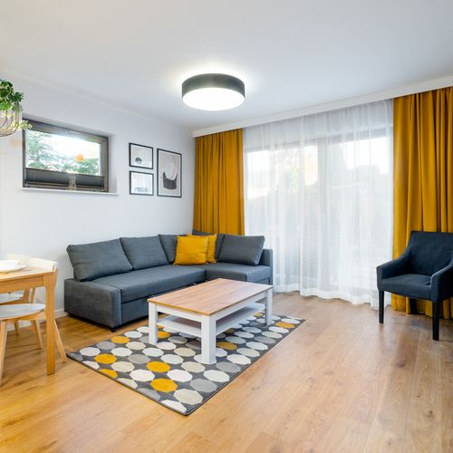 Apartament 4-osobowy z tarasem z dostępem do ogrodu z 2 pomieszczeniami sypialnianymi