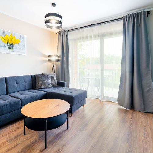 Apartament 5-osobowy z balkonem z aneksem kuchennym z 2 pomieszczeniami sypialnianymi