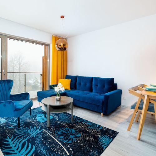 Apartament 4-osobowy z balkonem z widokiem na góry z 2 pomieszczeniami sypialnianymi