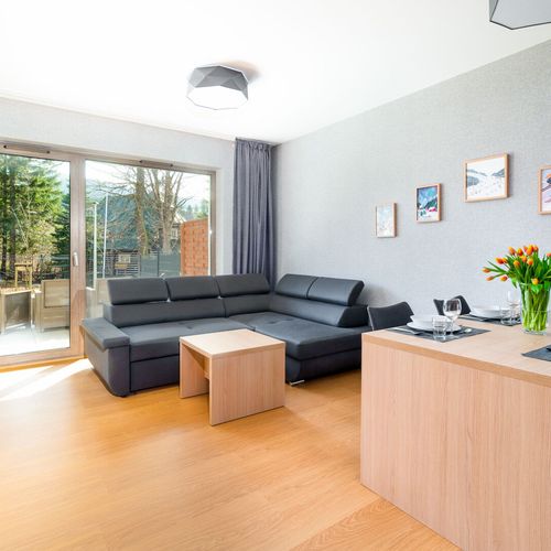 Apartament 4-osobowy z prysznicem z dostępem do ogrodu z 2 pomieszczeniami sypialnianymi