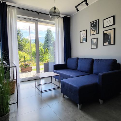 Apartament 4-osobowy na parterze z widokiem na góry z 2 pomieszczeniami sypialnianymi