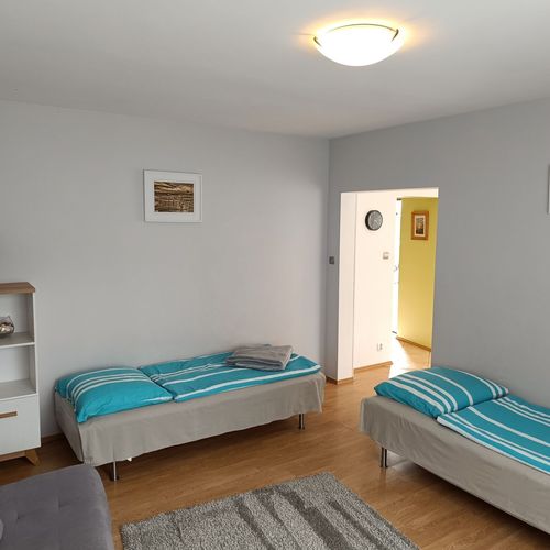 Apartament 4-osobowy z łazienką z dostępem do ogrodu z 2 pomieszczeniami sypialnianymi