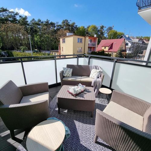 Apartament 4-osobowy z tarasem z aneksem kuchennym z 2 pomieszczeniami sypialnianymi (możliwa dostawka)