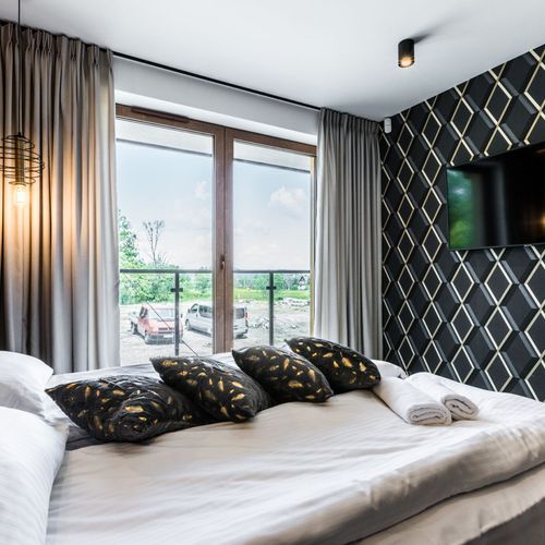 Apartament deluxe cu vedere spre munte cu 2 camere pentru 4 pers.