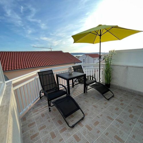 Apartament cu aer condiționat cu vedere spre mare cu 2 camere pentru 6 pers. A-22071-c