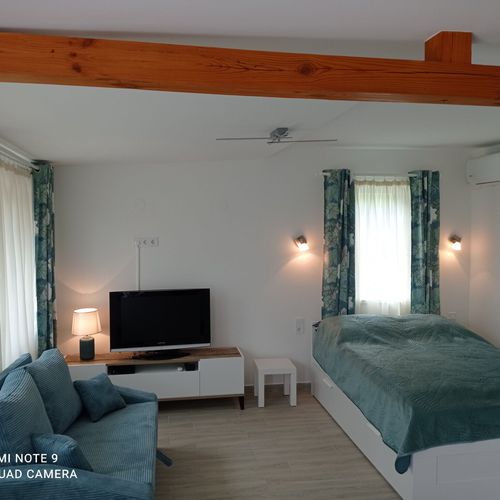 Apartman s manželskou postelí s 1 ložnicí s výhledem do zahrady na přízemí (s možností přistýlky)