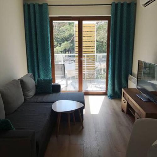 Apartament 4-osobowy z balkonem z 2 pomieszczeniami sypialnianymi
