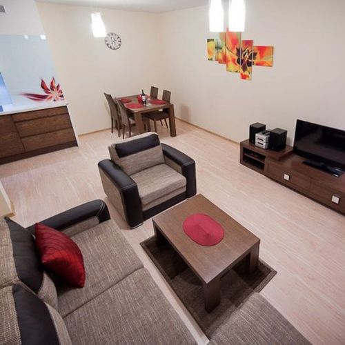 Apartament 4-osobowy z balkonem z aneksem kuchennym z 2 pomieszczeniami sypialnianymi