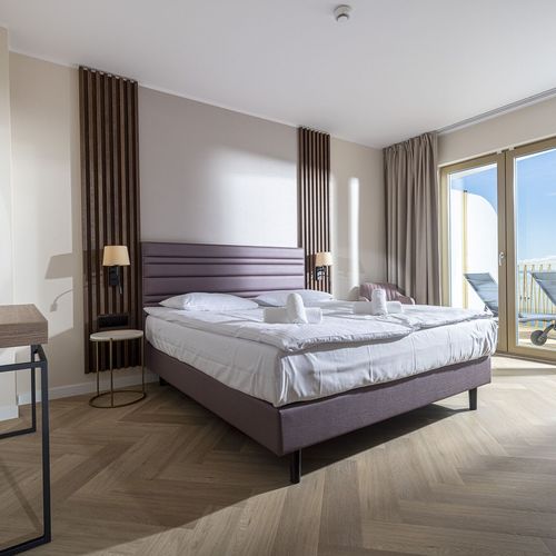 Apartament 4-osobowy z tarasem z 2 pomieszczeniami sypialnianymi