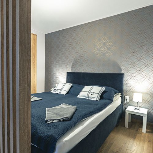 Apartament la parter cu vedere spre grădină cu 2 camere pentru 5 pers.