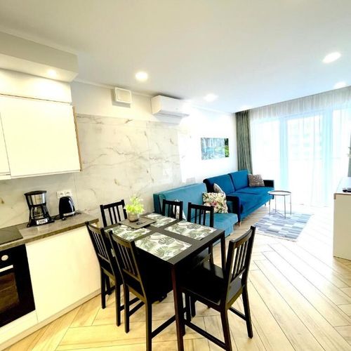 Apartament 8-osobowy z balkonem z 2 pomieszczeniami sypialnianymi