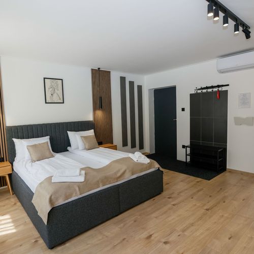 Apartament 2-osobowy na parterze z tarasem z 1 pomieszczeniem sypialnianym