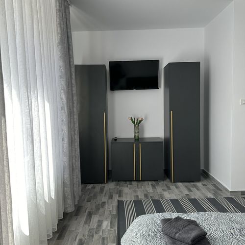 Apartament 4-osobowy na parterze z 2 pomieszczeniami sypialnianymi
