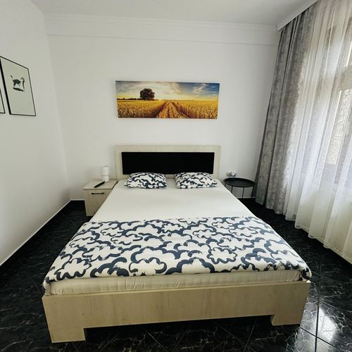 Apartament 4-osobowy na parterze z widokiem na ogród z 2 pomieszczeniami sypialnianymi