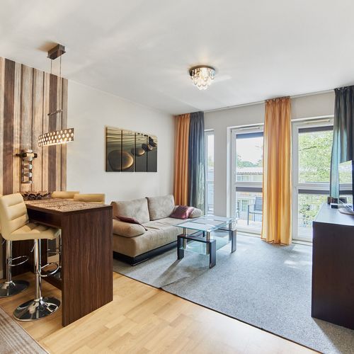 Apartament 4-osobowy na piętrze z balkonem z 2 pomieszczeniami sypialnianymi