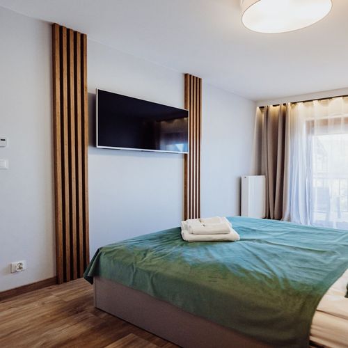 Apartament 4-osobowy na parterze z widokiem na góry z 2 pomieszczeniami sypialnianymi (możliwa dostawka)