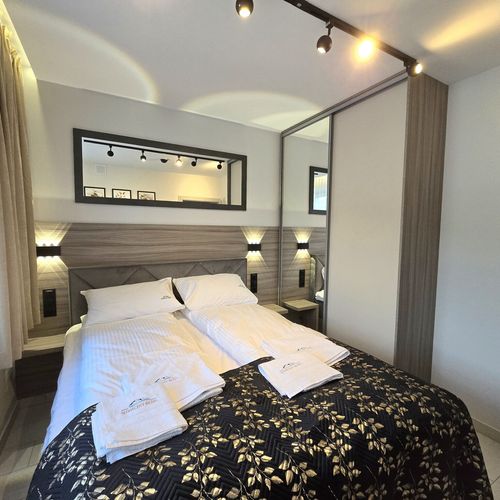 Apartament 4-osobowy na piętrze Gold z 2 pomieszczeniami sypialnianymi