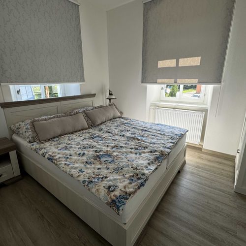 Apartman se sprchou s privátní koupelnou mimo apartmán s manželskou postelí s 1 ložnicí