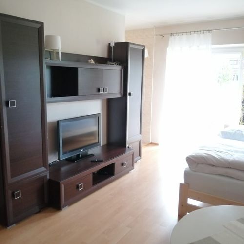 Apartament 4-osobowy z balkonem z aneksem kuchennym z 1 pomieszczeniem sypialnianym