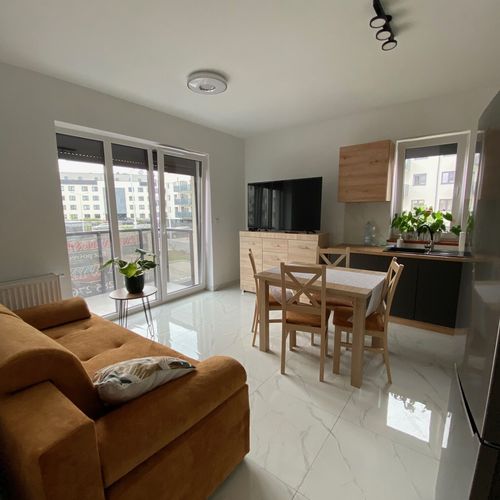 Apartament 4-osobowy z balkonem z aneksem kuchennym