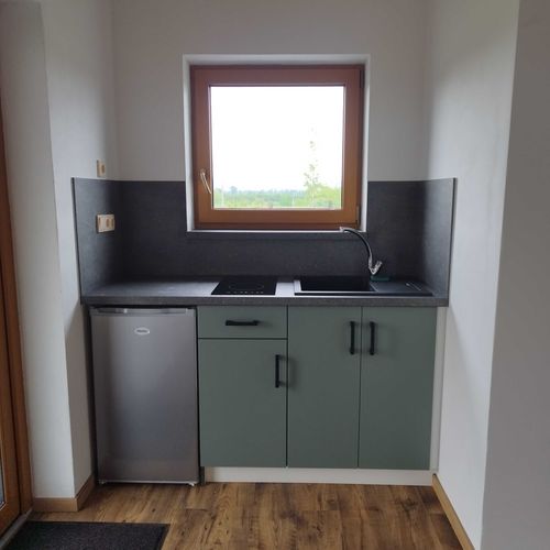 Apartman se sprchou s privátní koupelnou mimo apartmán s manželskou postelí s 1 ložnicí