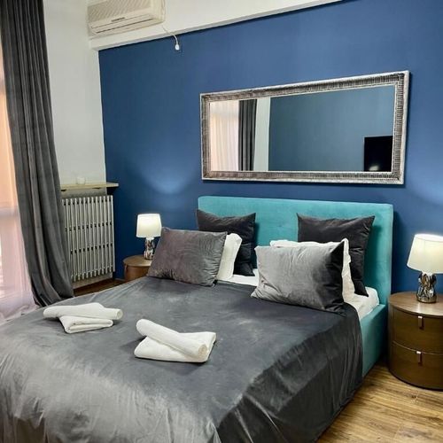 Studio Apartman (jako celek) s manželskou postelí s výhledem na město