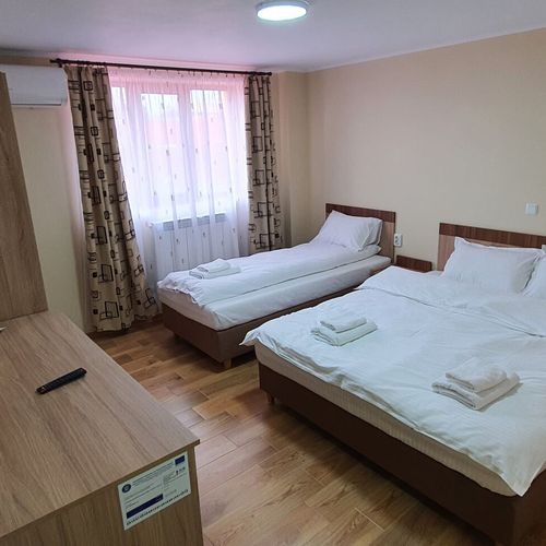 Camera tripla la mansardă