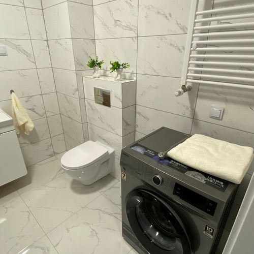 Apartament 1-osobowy na parterze z aneksem kuchennym z 1 pomieszczeniem sypialnianym