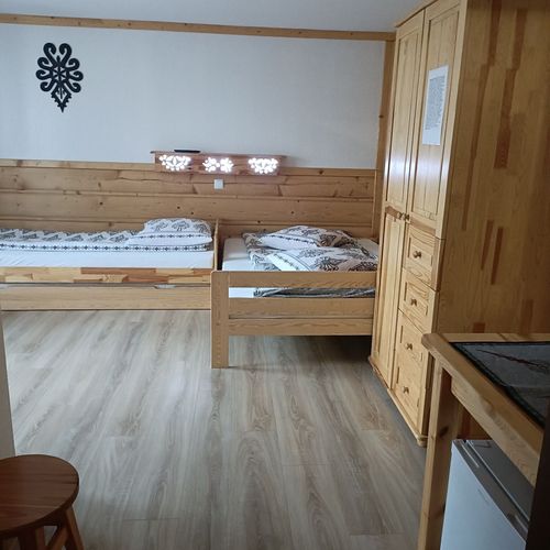 Pokoj pro 4 os. s výhledem na hory na poschodí