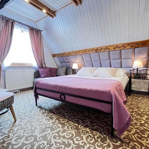 Apartament 4-osobowy na poddaszu typu Twin z 2 pomieszczeniami sypialnianymi