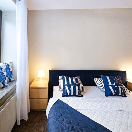 Apartament 4-osobowy z balkonem z 2 pomieszczeniami sypialnianymi