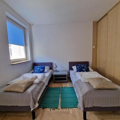 Apartament 4-osobowy z 2 pomieszczeniami sypialnianymi