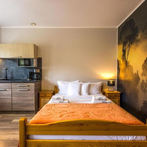 Apartament 4-osobowy z balkonem z 2 pomieszczeniami sypialnianymi