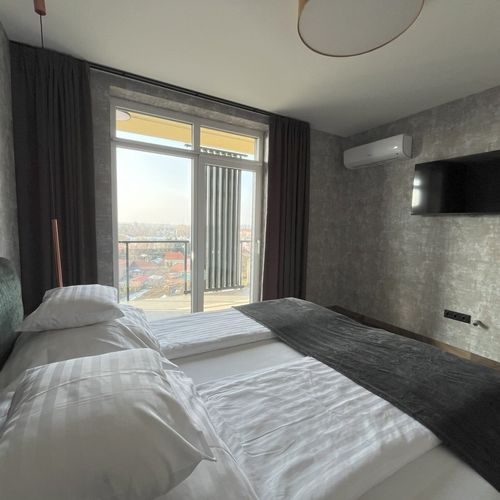 Apartament la mansardă cu vedere spre oraș cu 3 camere pentru 6 pers.