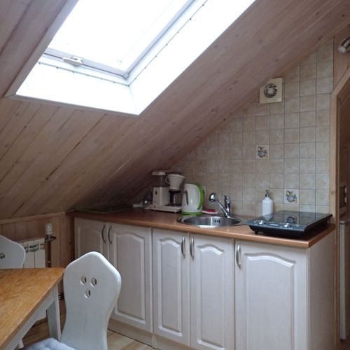 Pokój 4-osobowy na poddaszu Tourist