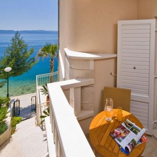 Apartament 2-osobowy z balkonem częściowy z widokiem na morze z 1 pomieszczeniem sypialnianym