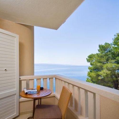 Apartament 4-osobowy Deluxe częściowy z widokiem na morze z 2 pomieszczeniami sypialnianymi