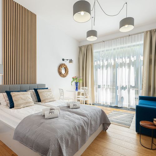 Apartament 4-osobowy na parterze z dostępem do ogrodu z 1 pomieszczeniem sypialnianym