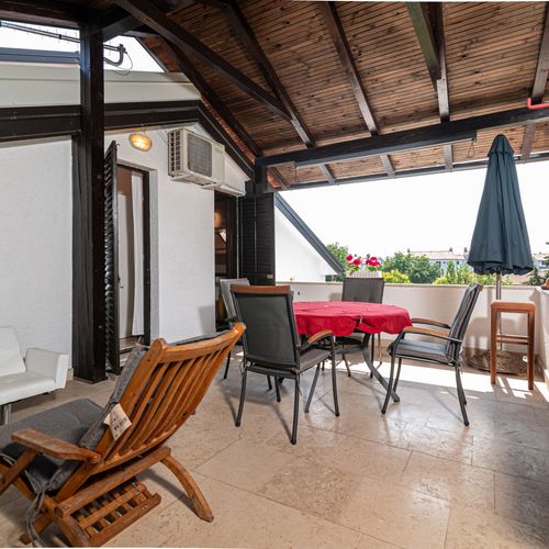 Apartament 4-osobowy z klimatyzacją z tarasem z 1 pomieszczeniem sypialnianym A-23561-b